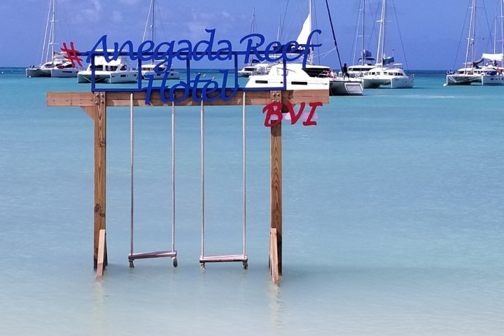 a boat is docked next to a body of water